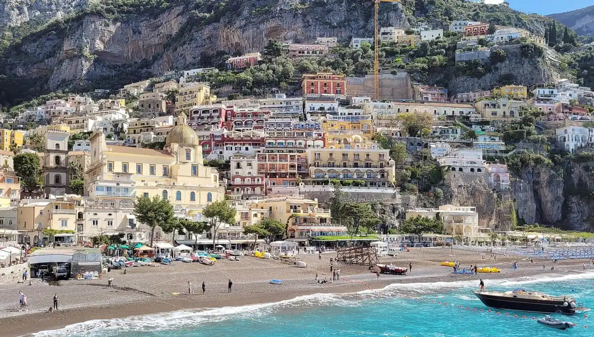 Positano beach and cliffside houses on the Amalfi Coast