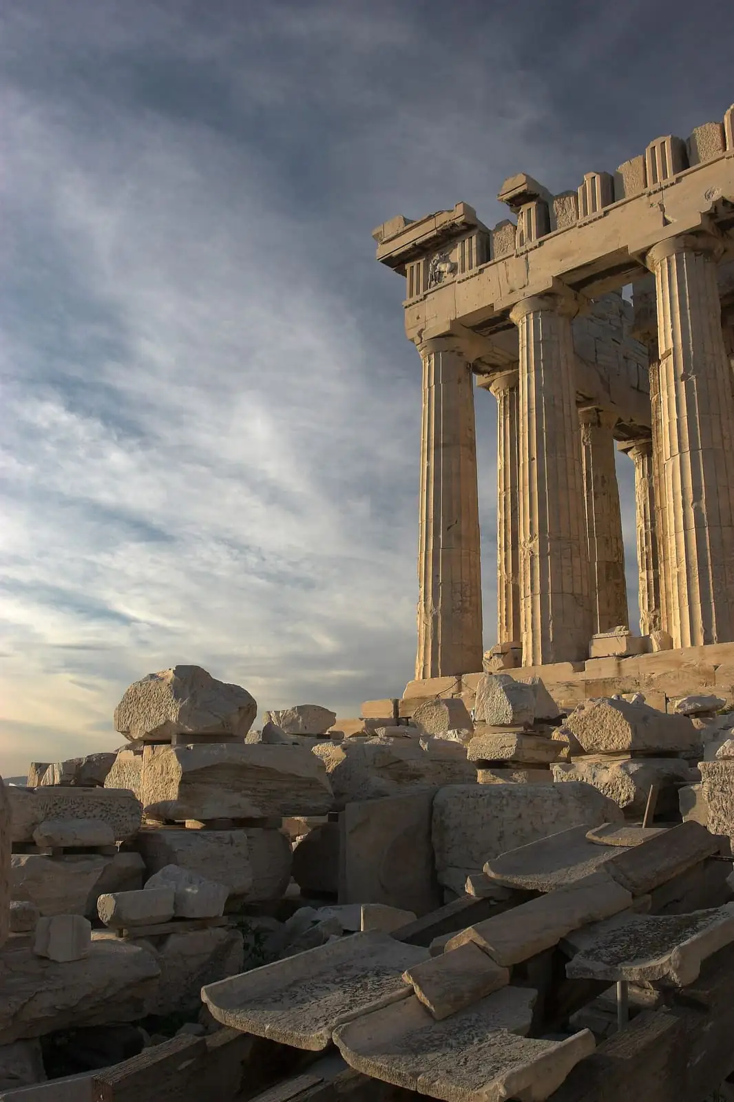 The Parthenon columns from the south in Athens, with ancient stone blocks in the foreground