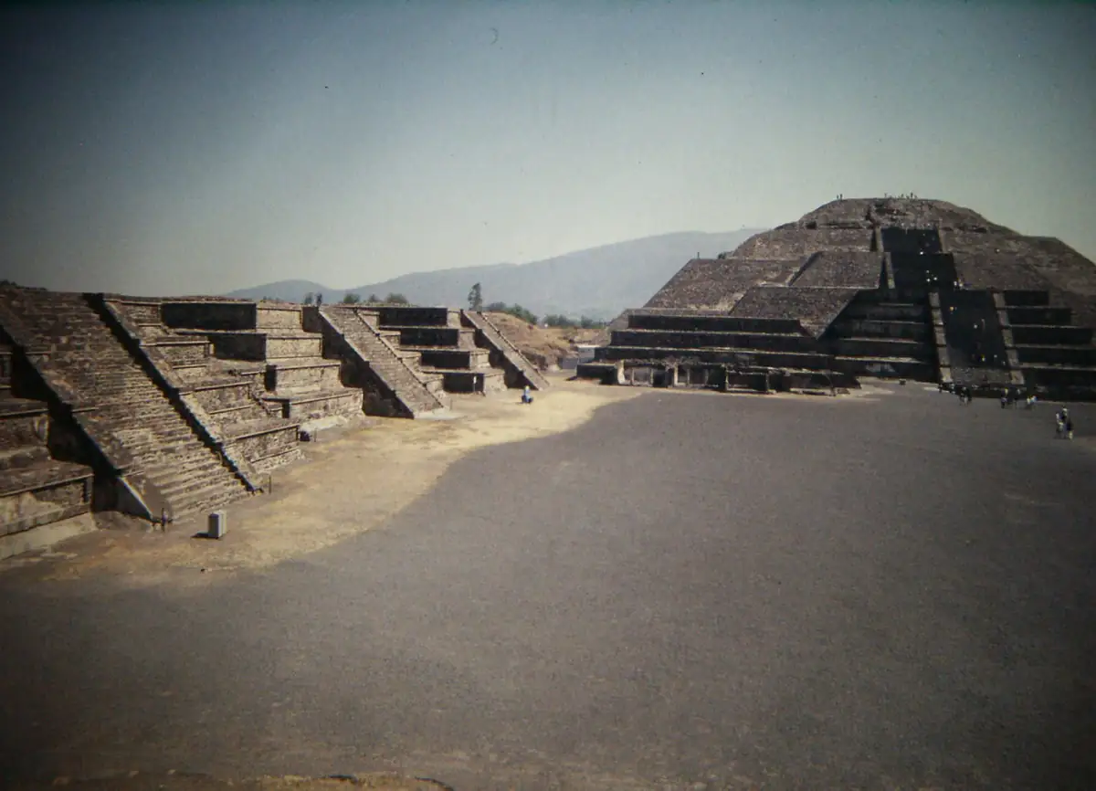 The stepped Moon Pyramid and the Avenue of the Dead at Teotihuacan under a clear sky