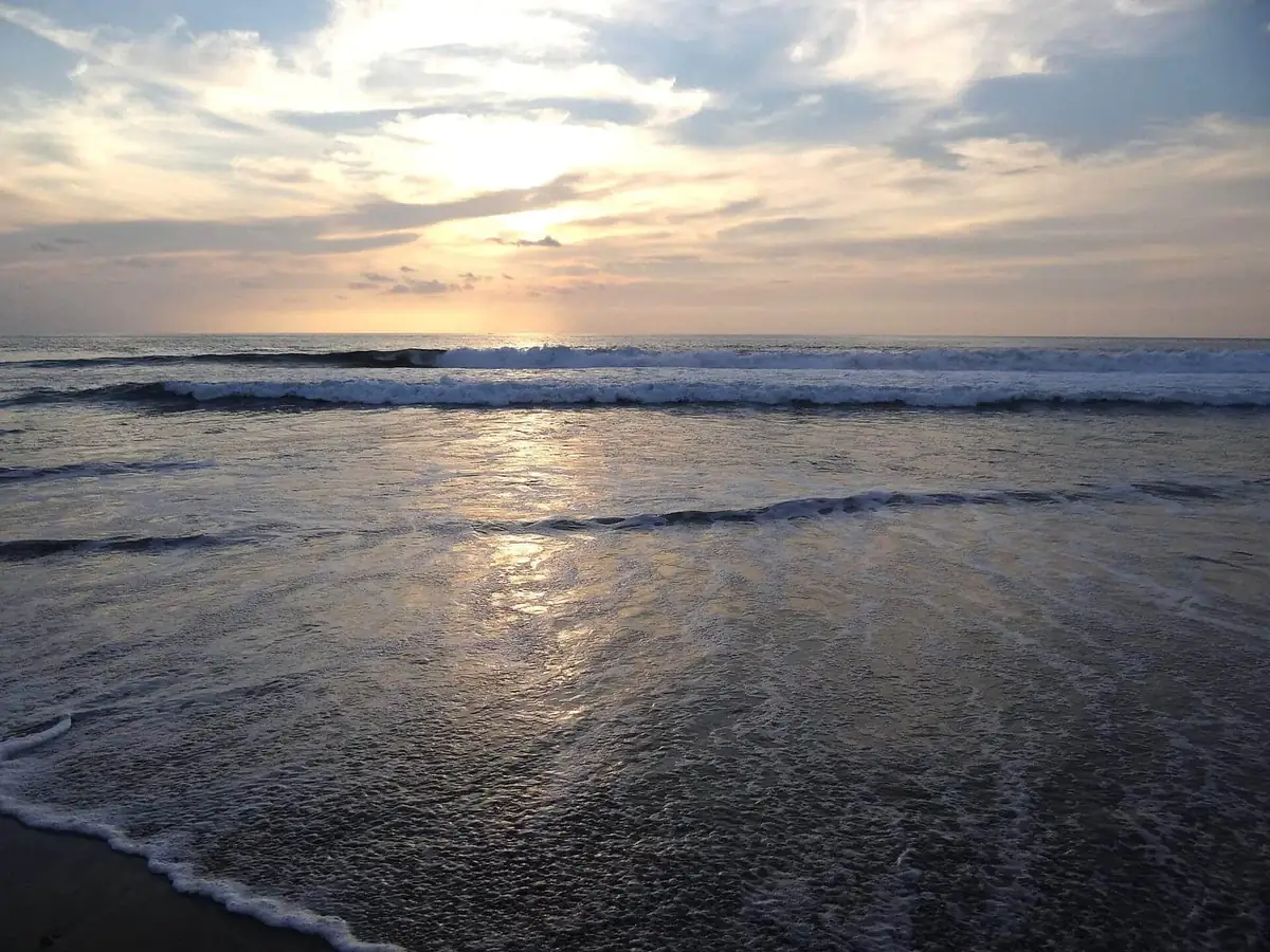 Sunset surf rolling onto Zicatela beach