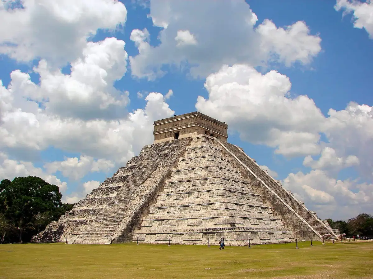 The Pyramid of Kukulkan rising over the lawn at Chichen Itza