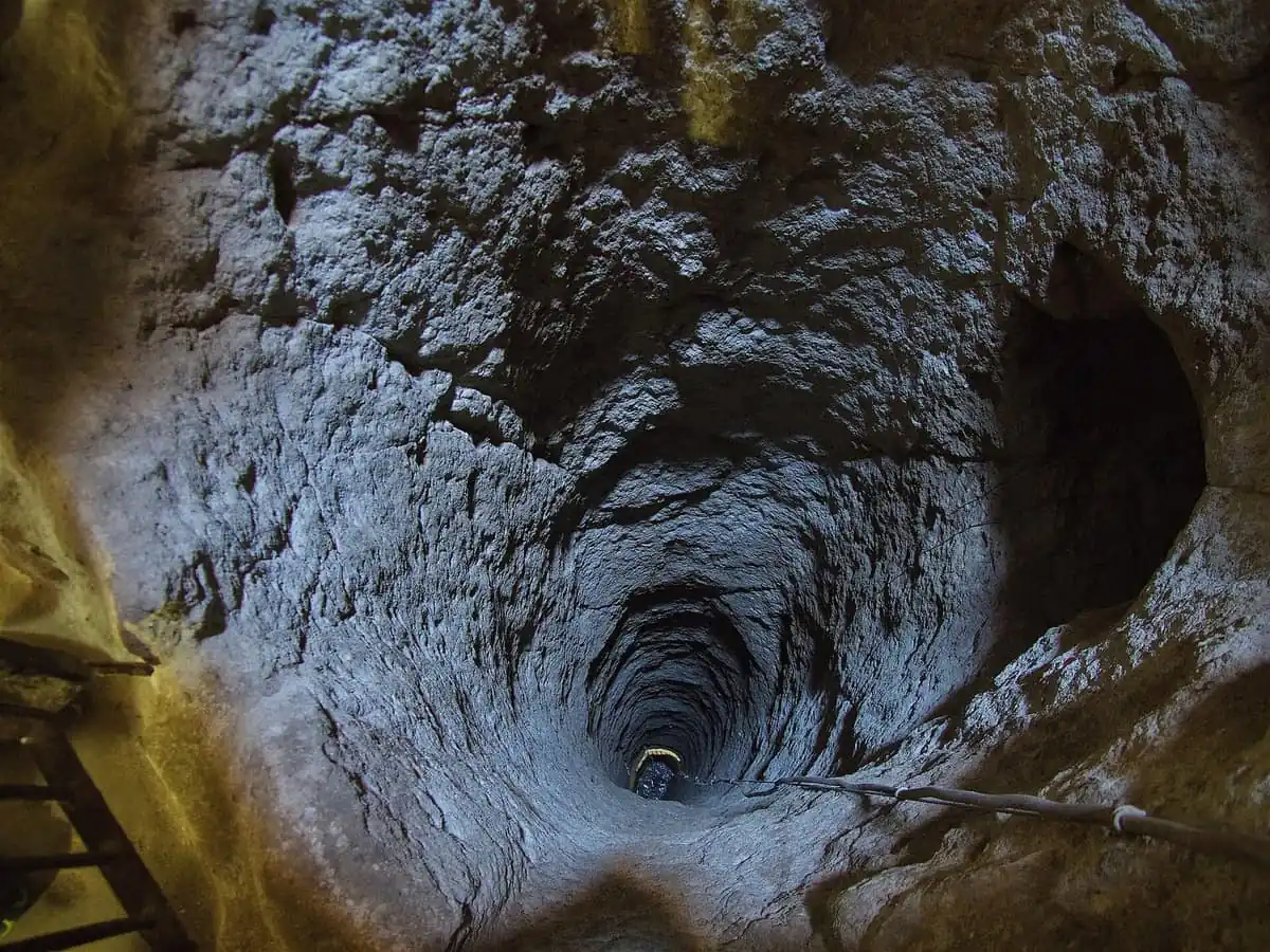 Looking down a deep ventilation shaft inside Derinkuyu underground city