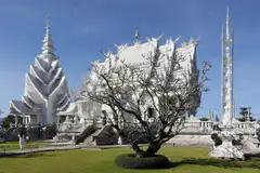 The mirrored white façade of Wat Rong Khun, the White Temple, south of Chiang Rai