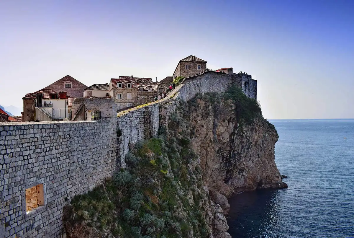 Walkers on the sea-facing stretch of the walls