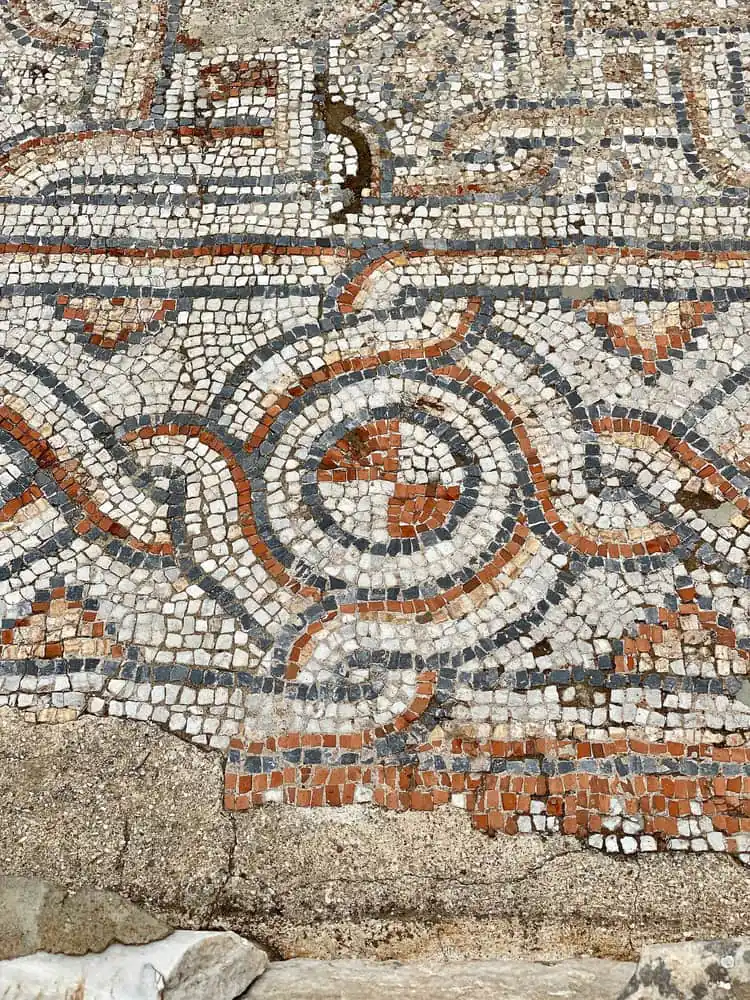 Geometric mosaic floors inside the roofed Terrace Houses complex