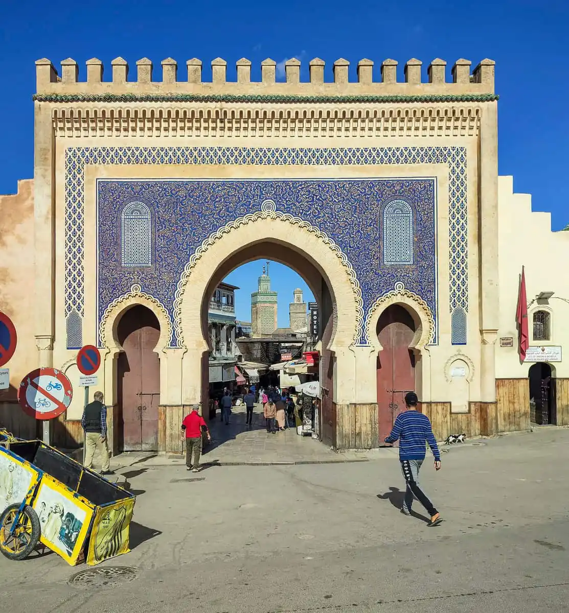 The blue-tiled Bab Bou Jeloud gate with its central arch opening onto the medina lanes