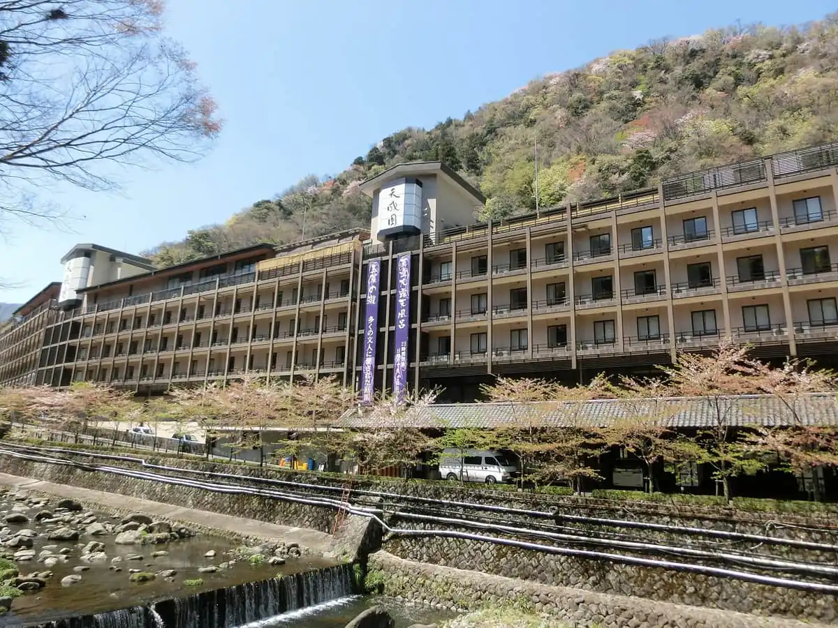 A ryokan building beside the river in Hakone Yumoto