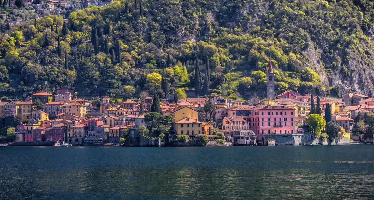 Varenna houses and church tower on Lake Como seen from the water