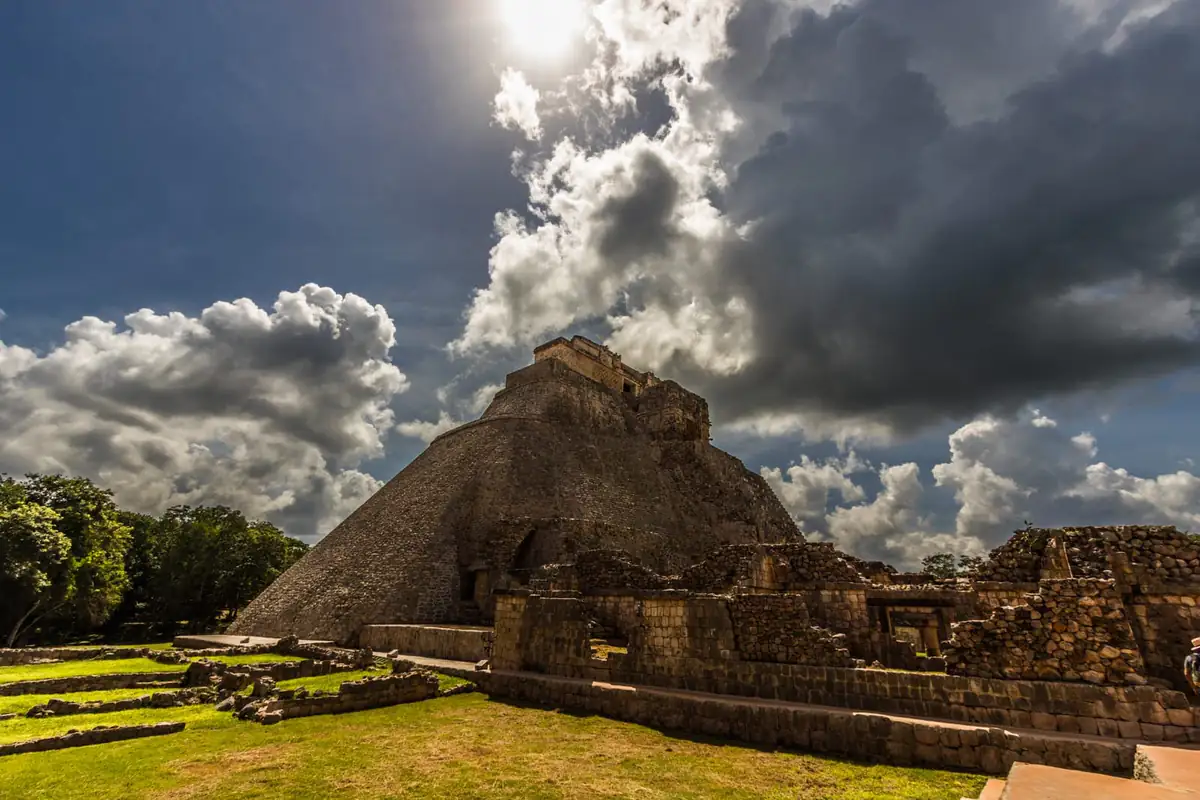 The Pyramid of the Magician at Uxmal under a dramatic sky