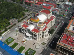 Aerial view of the Palacio de Bellas Artes with its yellow and white domes
