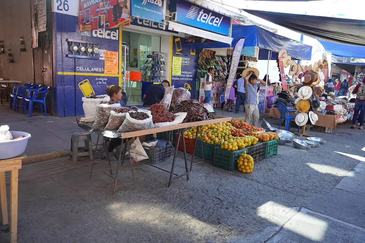 Chili and fruit stalls at the Tlacolula market in Oaxaca