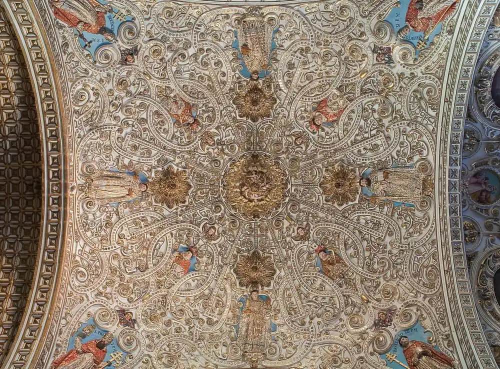 The gilded vaulted ceiling inside Santo Domingo church