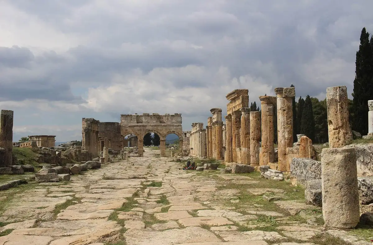 The Frontinus Gate and colonnaded street at Hierapolis in bright afternoon light