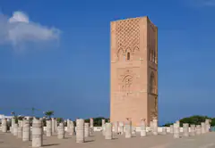 The unfinished Hassan Tower rising above the stone column stumps of its planned prayer hall in Rabat