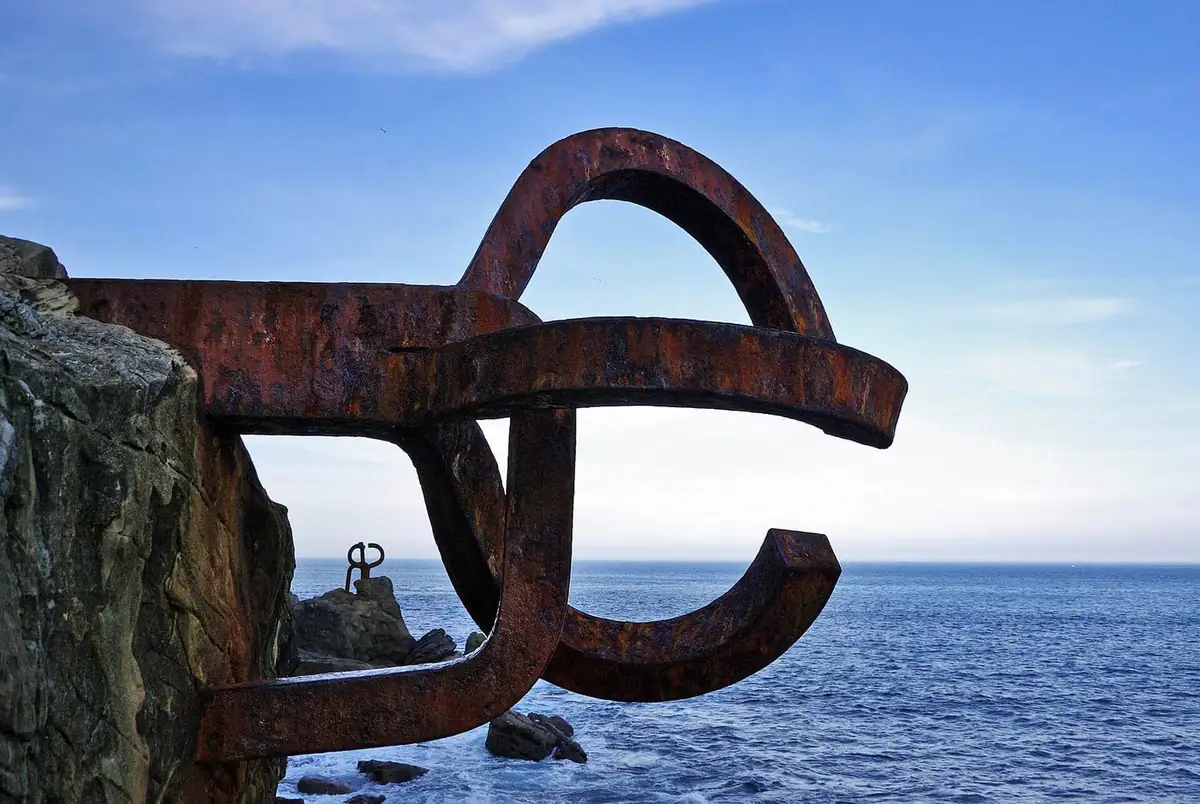Chillida's Peine del Viento steel sculpture bolted into the rocks above the sea in San Sebastián
