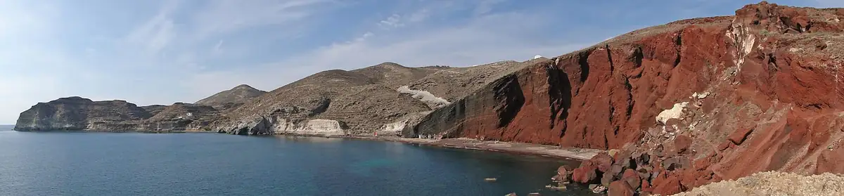Red Beach on Santorini, with red volcanic cliffs above dark sand