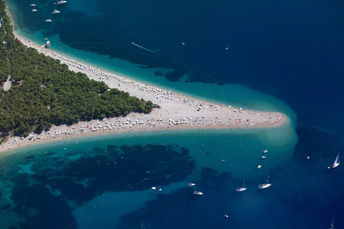 Zlatni Rat spit from above with beach crowds