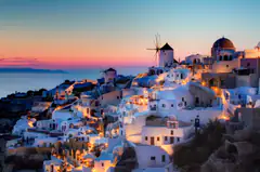 Oia on Santorini glowing at sunset