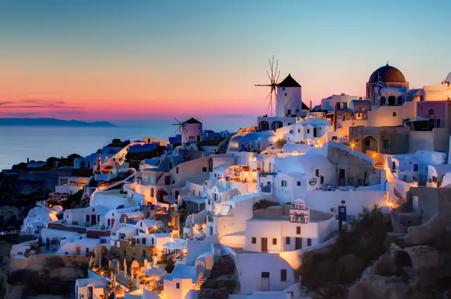 Oia on Santorini glowing at sunset
