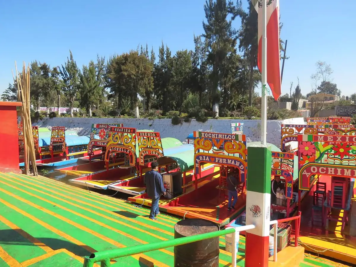 Colourful trajineras moored at the Xochimilco canals