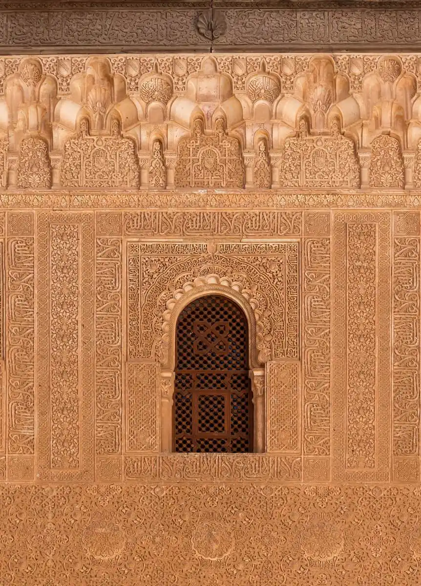 The gilded window and Nasrid motto in the Cuarto Dorado, Alhambra
