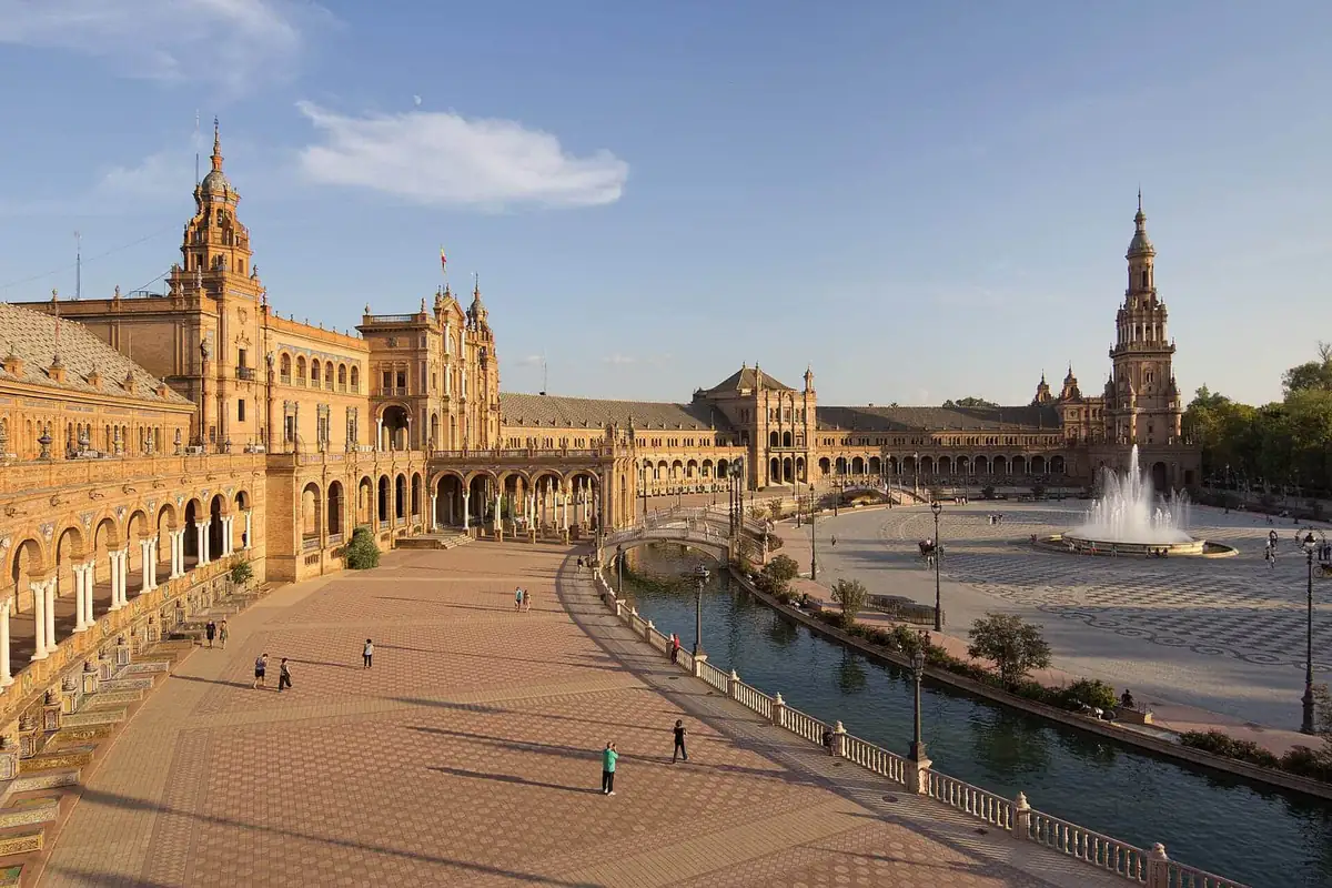 The Plaza de España in Seville with its canal, bridge and fountain in late afternoon light