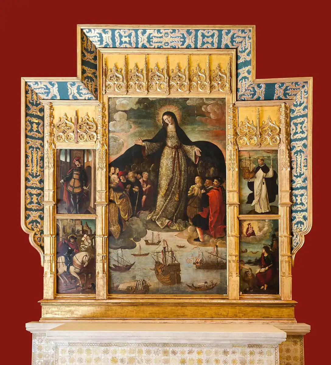 The Virgen de los Mareantes altarpiece in the Alcazar of Seville, a gilded panel painting of the Virgin with ships below