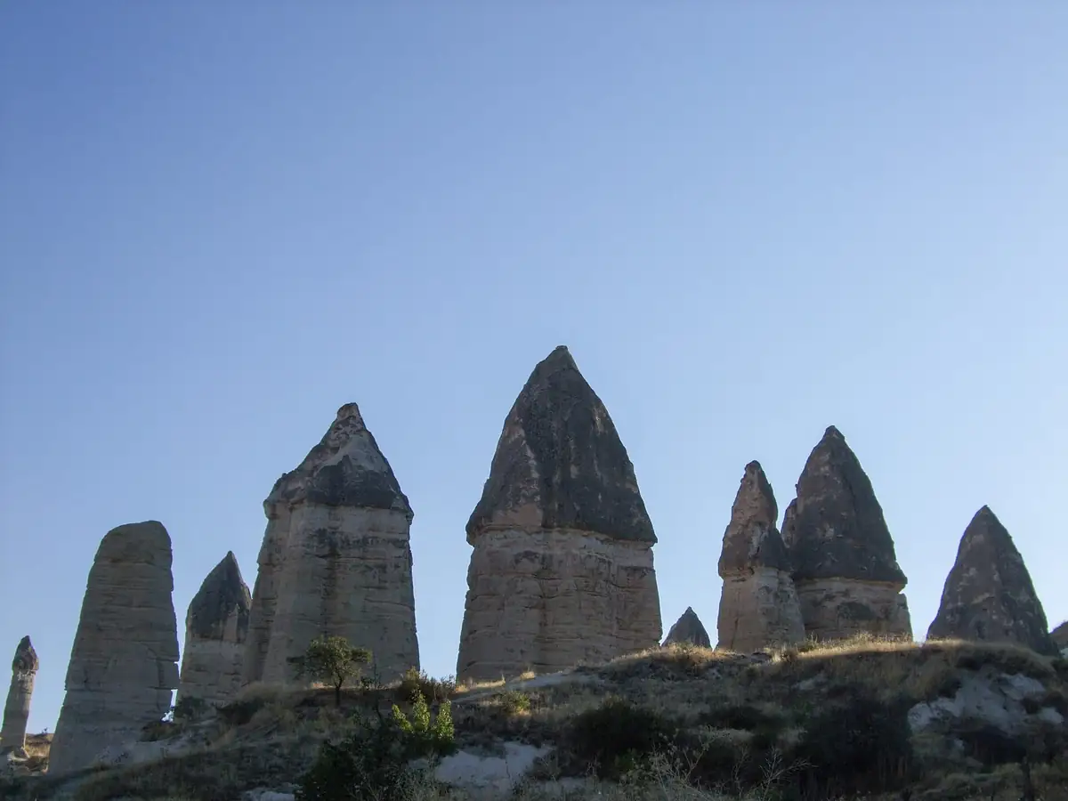 Tall fairy chimneys rising from the slopes of Love Valley