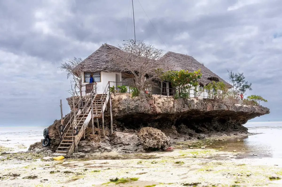 The Rock restaurant on its coral outcrop at low tide near Paje, Zanzibar