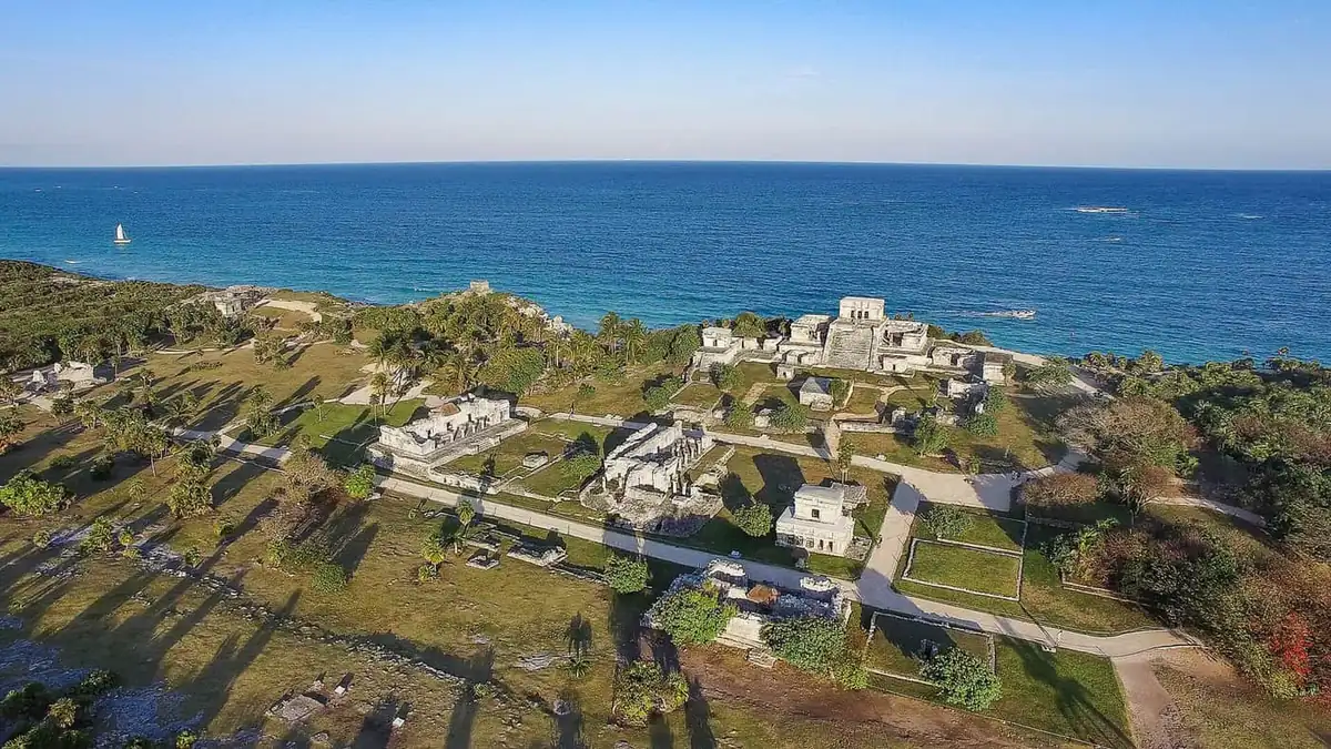 Aerial view of the clifftop Tulum Mayan ruins above the turquoise Caribbean Sea