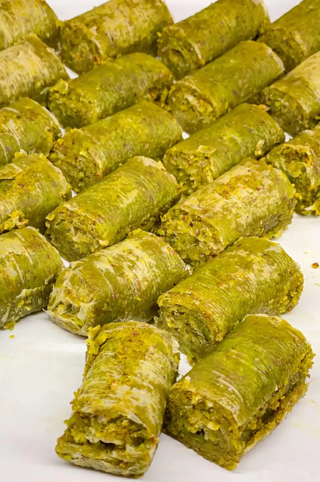 Pistachio baklava rolls packed with green Antep nuts