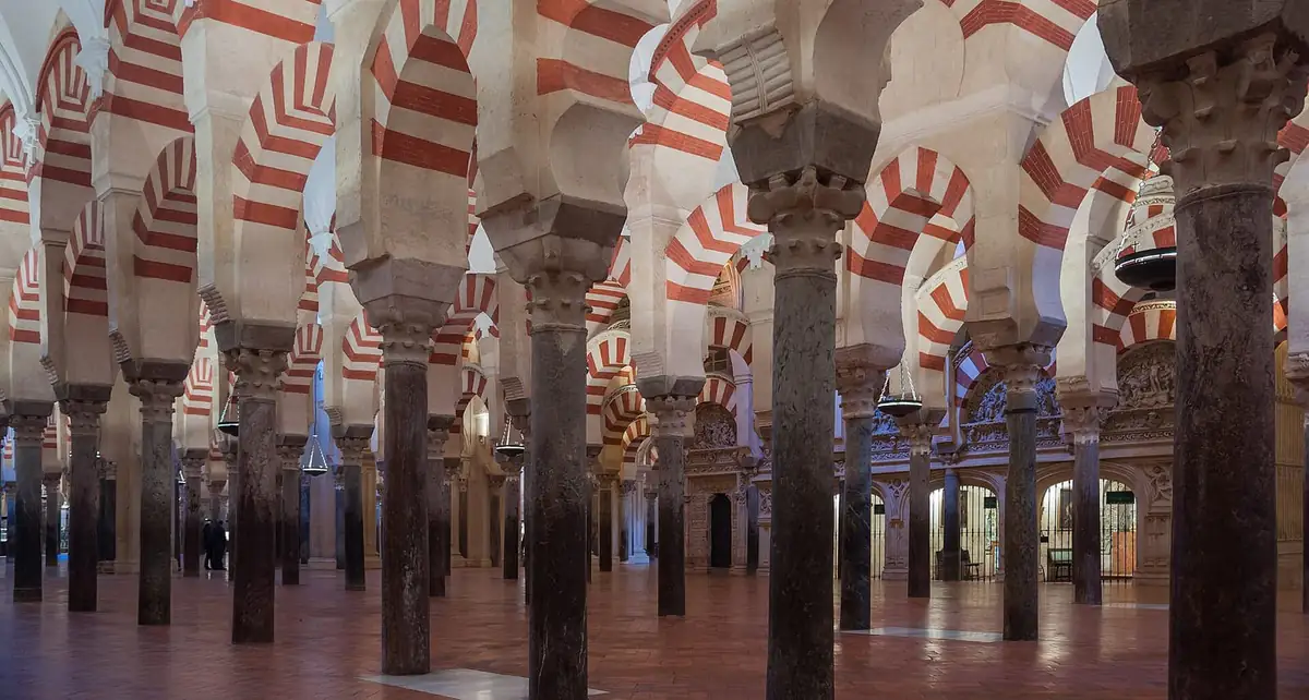 The forest of red and white columns inside the Mezquita in Cordoba
